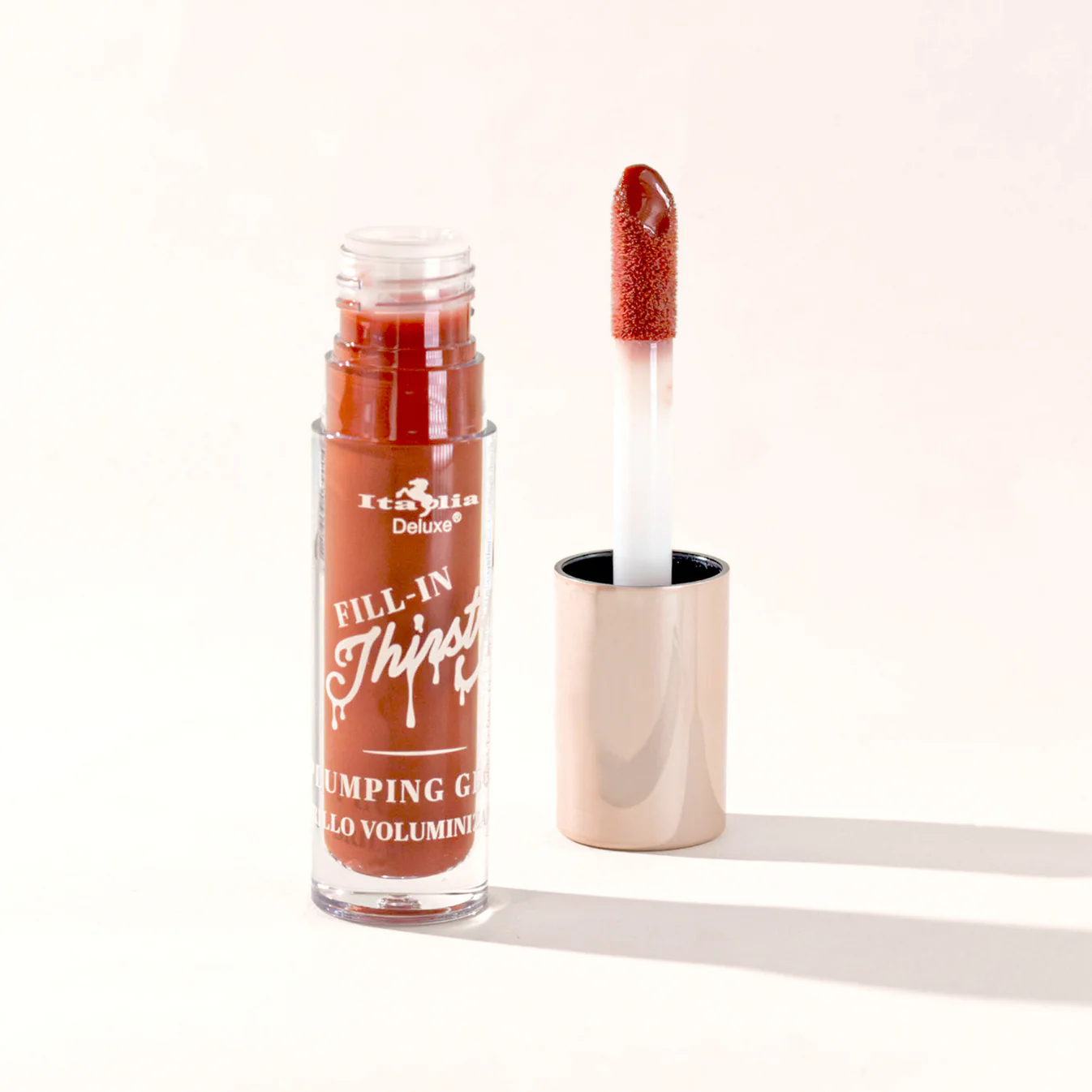 Fill-In Thirsty Colored Plumping Gloss con vitamina E y efecto volumen – Nina Cosmetics