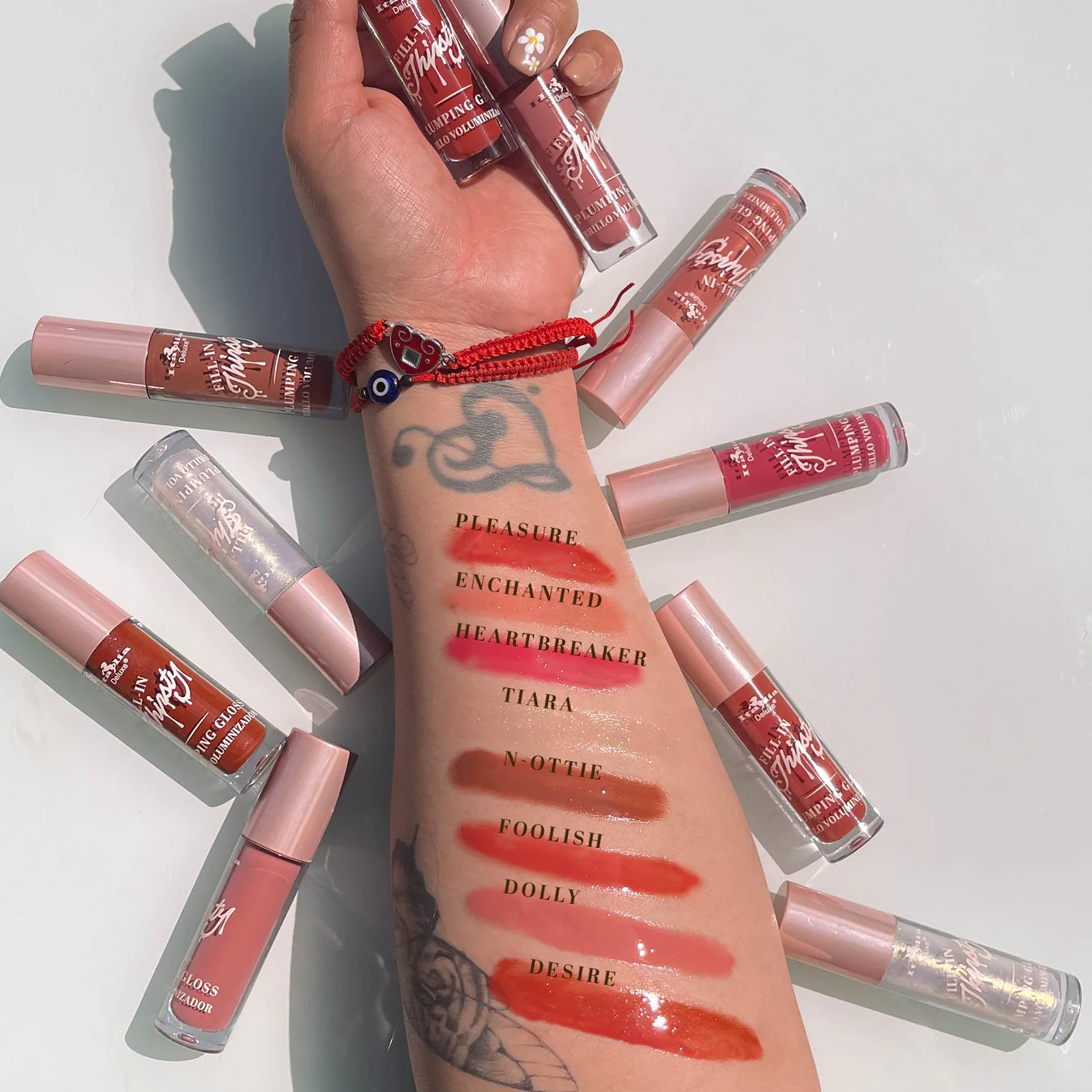 Fill-In Thirsty Colored Plumping Gloss con vitamina E y efecto volumen – Nina Cosmetics