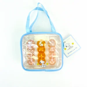 Aceite labial Peanuts set de 3 piezas con bolsa hidratante con vitaminas para labios