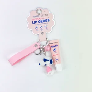 Lip gloss Peanuts Celavi con llavero hidratante con shea butter para labios suaves y brillantes