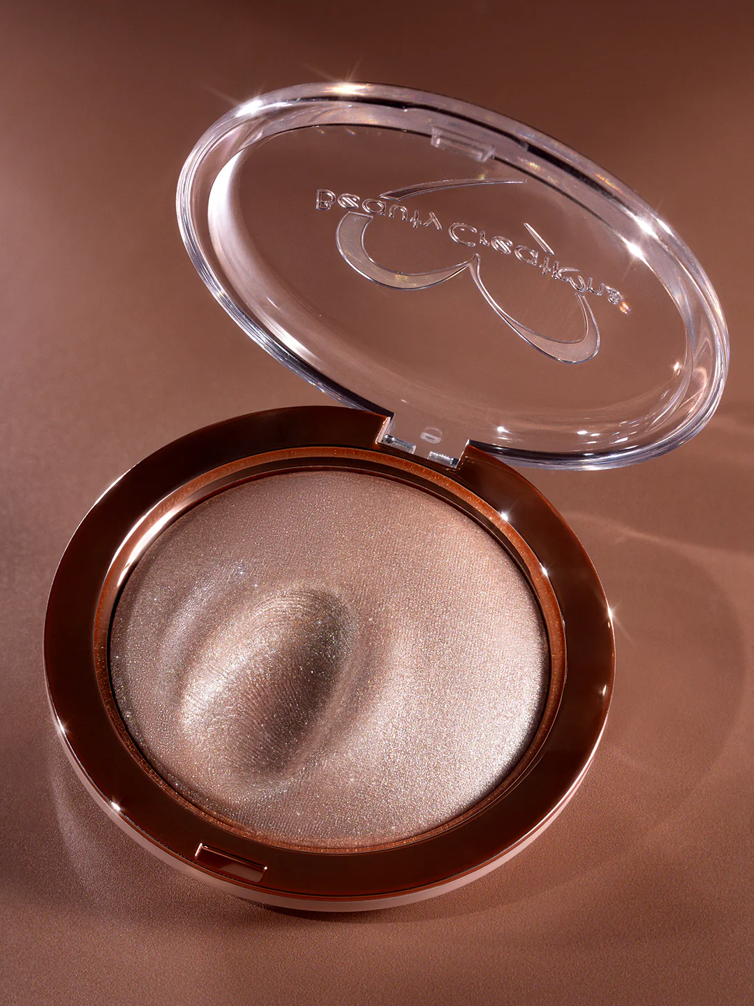 Flawless Stay Shimmer Veil Beauty Creations iluminador crema a polvo con acabado luminoso y reflectante