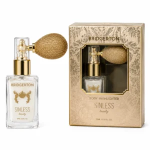 Sinless Beauty Body Highlighter Bridgerton con aplicador tipo pompón para iluminar el cuerpo